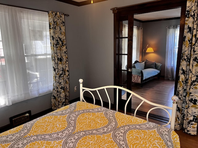30 Highland Ave, Dixfield, ME 04224 - bedroom featuring wood finished floors and crown molding