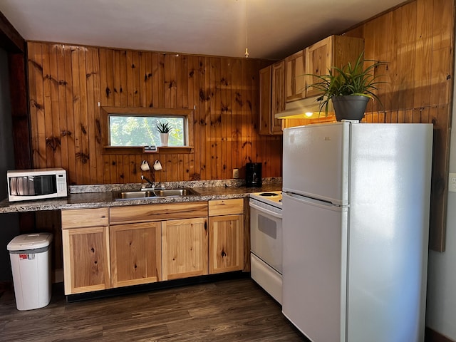 30 Highland Ave, Dixfield, ME 04224 - kitchen with white appliances, a sink, wooden walls, dark wood-type flooring, and under cabinet range hood
