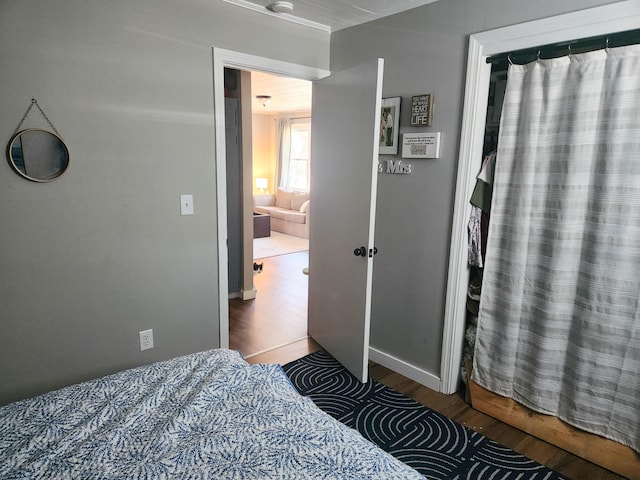 65 Pearce Ave, Houlton, ME 04730 - bedroom featuring wood finished floors and baseboards