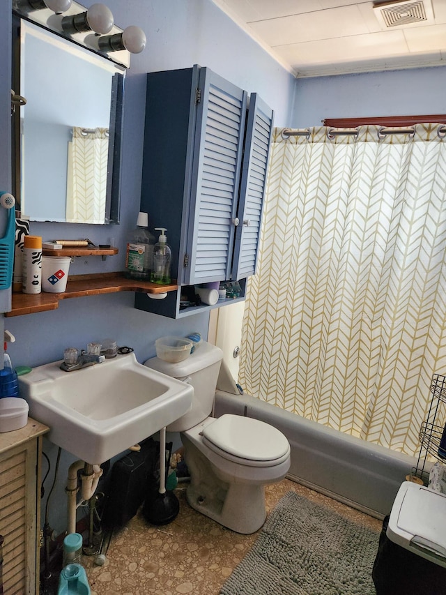 65 Pearce Ave, Houlton, ME 04730 - full bath featuring toilet, shower / bathtub combination with curtain, and a sink