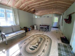 254 Eaton Rd, Dexter, ME 04435 - living area featuring lofted ceiling