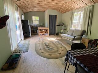 254 Eaton Rd, Dexter, ME 04435 - living area featuring lofted ceiling