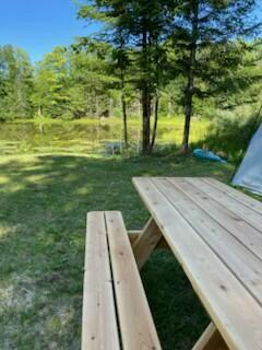 254 Eaton Rd, Dexter, ME 04435 - view of community with a yard