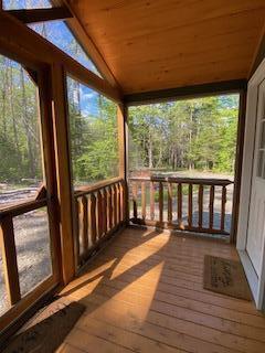 254 Eaton Rd, Dexter, ME 04435 - unfurnished sunroom with vaulted ceiling