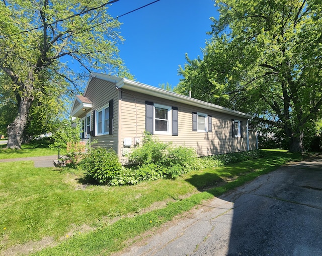 51 Francis St, Waterville, ME 04901 - view of side of property with a lawn