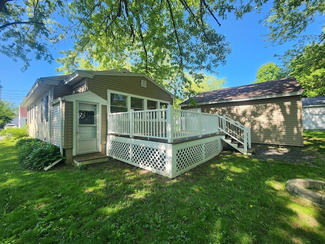 51 Francis St, Waterville, ME 04901 - rear view of property with a deck and a yard