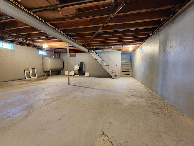 51 Francis St, Waterville, ME 04901 - below grade area featuring heating fuel and stairs