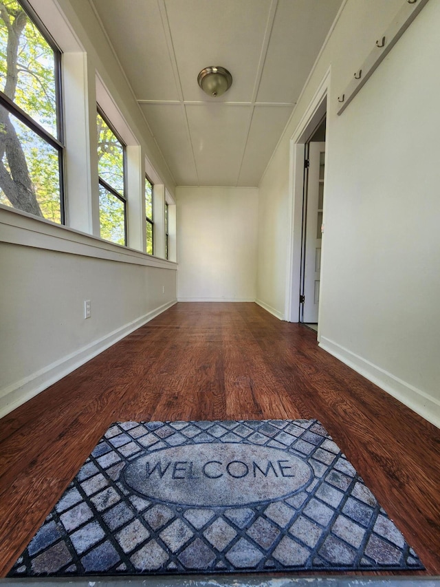 51 Francis St, Waterville, ME 04901 - unfurnished room with wood finished floors, baseboards, and plenty of natural light