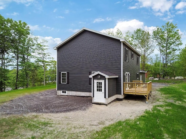 65 May Way, Sidney, ME 04330 - view of property exterior featuring a deck