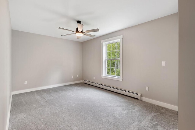 65 May Way, Sidney, ME 04330 - empty room with baseboard heating, a ceiling fan, carpet floors, and baseboards