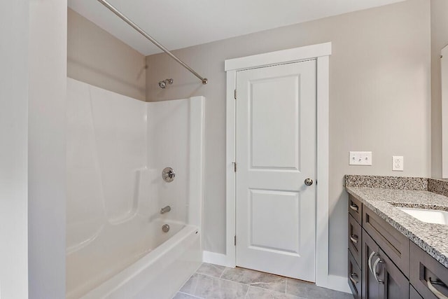 65 May Way, Sidney, ME 04330 - full bath featuring vanity, tub / shower combination, and baseboards