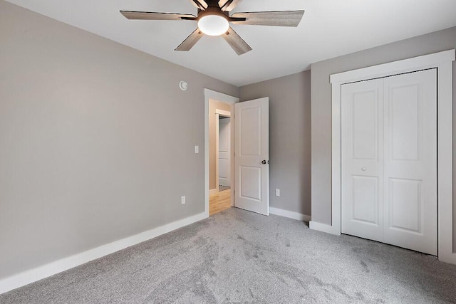 65 May Way, Sidney, ME 04330 - unfurnished bedroom with carpet floors, baseboards, a closet, and a ceiling fan