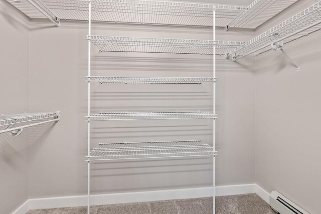 65 May Way, Sidney, ME 04330 - spacious closet featuring a baseboard heating unit and carpet flooring