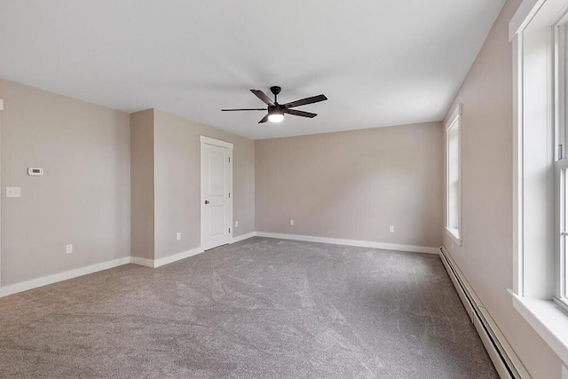 65 May Way, Sidney, ME 04330 - spare room with a baseboard radiator, ceiling fan, carpet floors, and baseboards