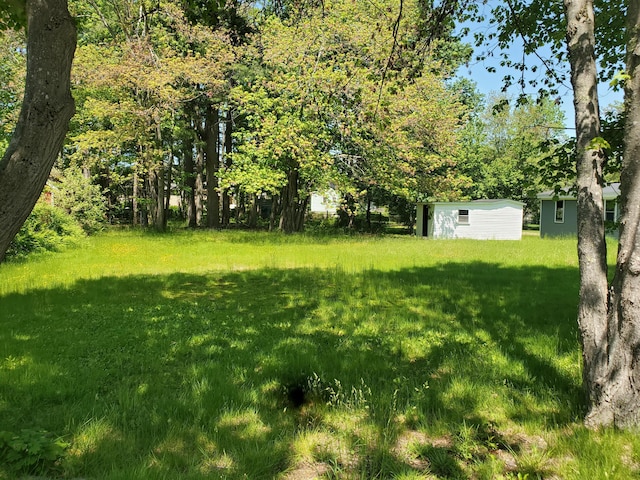 30 Westland Ave, Biddeford, ME 04005 - view of grassy yard with an outdoor structure
