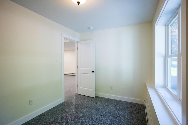74 Hebron Rd, Paris, ME 04281 - spare room with baseboards, a baseboard heating unit, and a smoke detector