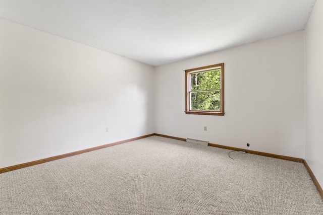 117 Taylor Woods Rd, Belgrade, ME 04917 - spare room featuring light colored carpet and baseboards
