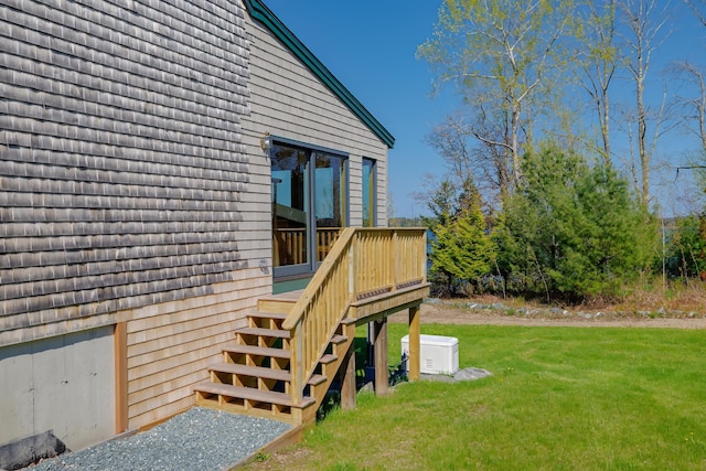 438 Oak Point Rd, Trenton, ME 04605 - view of grassy yard with stairway and a wooden deck