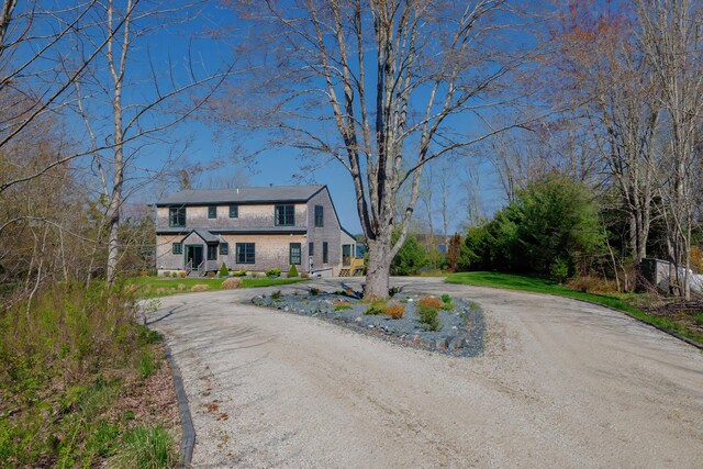 438 Oak Point Rd, Trenton, ME 04605 - view of front facade featuring curved driveway