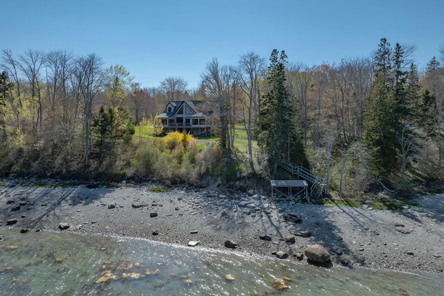 438 Oak Point Rd, Trenton, ME 04605 - exterior space with a heavily wooded area