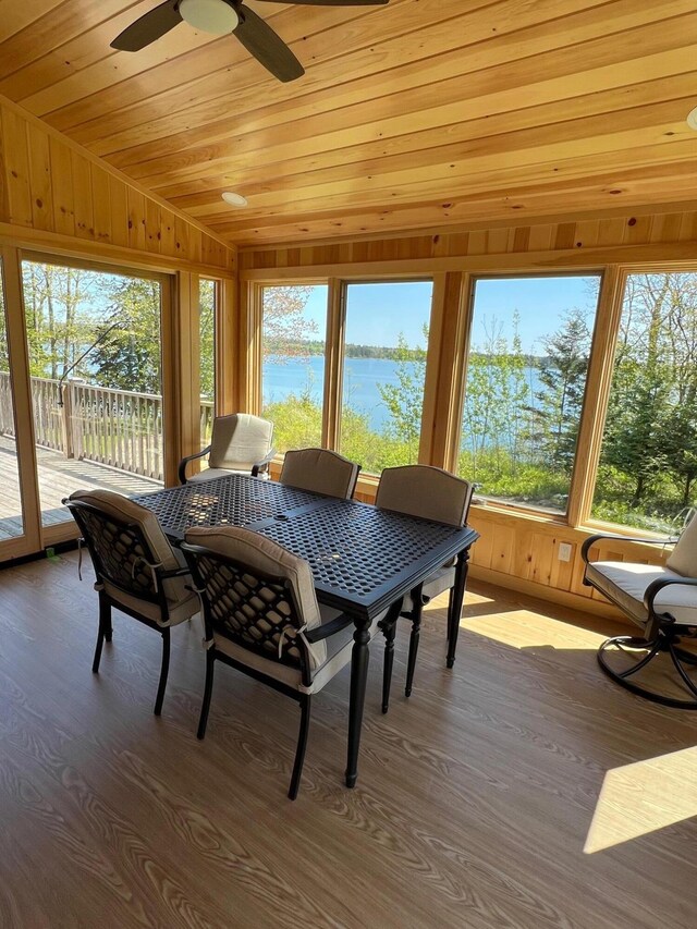 438 Oak Point Rd, Trenton, ME 04605 - sunroom / solarium with a water view, wood finished floors, and wood ceiling