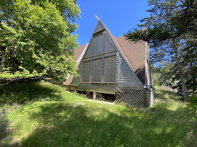 219 Willis Ln, Islesboro, ME 04848 - rear view of house with a shingled roof