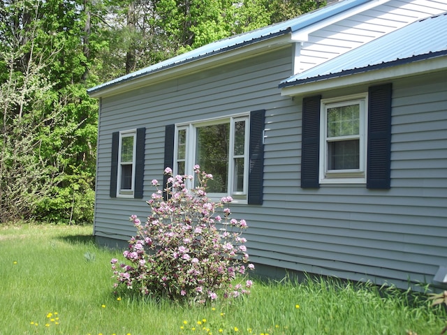 396 Waterville Rd, Norridgewock, ME 04957 - view of property exterior with metal roof