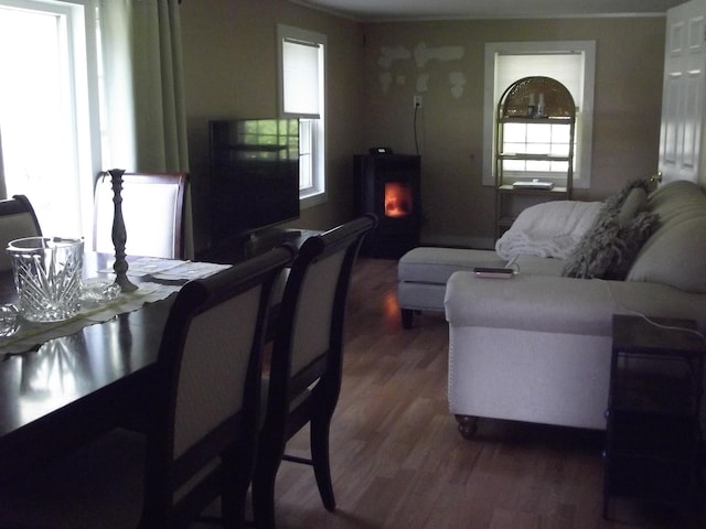 396 Waterville Rd, Norridgewock, ME 04957 - living room with wood finished floors, healthy amount of natural light, and a warm lit fireplace