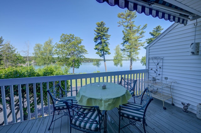 4 Goodridge Dr Unit 4, Naples, ME 04055 - wooden terrace featuring a water view and outdoor dining space