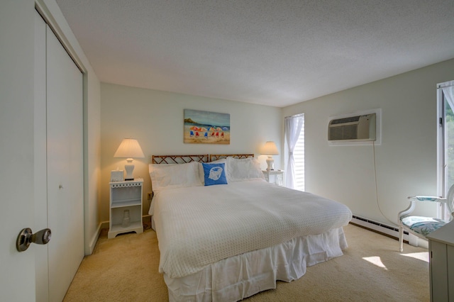4 Goodridge Dr Unit 4, Naples, ME 04055 - bedroom featuring light carpet, multiple windows, and a wall mounted air conditioner