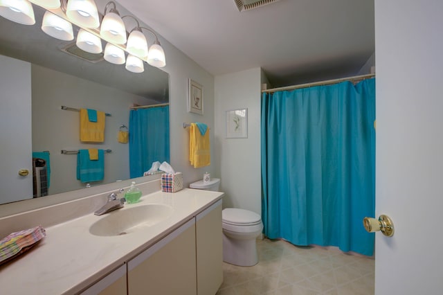 4 Goodridge Dr Unit 4, Naples, ME 04055 - full bathroom featuring toilet, vanity, curtained shower, and tile patterned floors