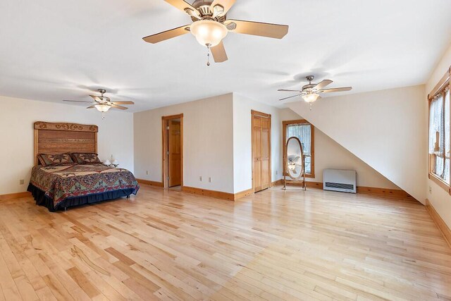 59 Lupine Dr, Belgrade, ME 04917 - bedroom with light wood-style floors, baseboards, and a ceiling fan