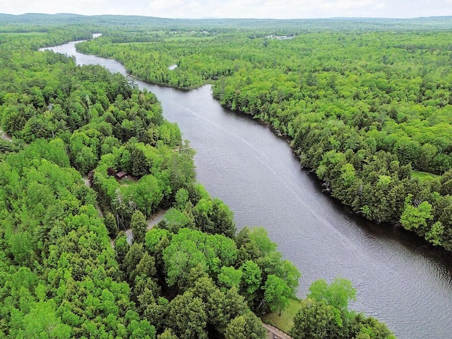59 Lupine Dr, Belgrade, ME 04917 - bird's eye view of a heavily wooded area and a nearby body of water