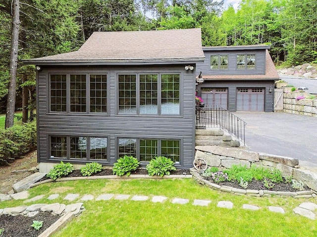 59 Lupine Dr, Belgrade, ME 04917 - view of front of home with a front lawn, asphalt driveway, and a shingled roof