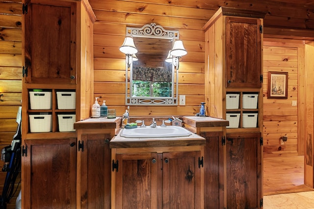 2451 Riverside Dr, Vassalboro, ME 04989 - bathroom featuring vanity and wood walls