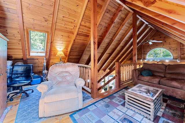2451 Riverside Dr, Vassalboro, ME 04989 - living area with wood walls, wooden ceiling, wood finished floors, and ceiling fan