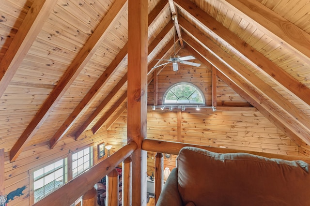 2451 Riverside Dr, Vassalboro, ME 04989 - detailed view of wooden ceiling with exposed beams, wood walls, and ceiling fan