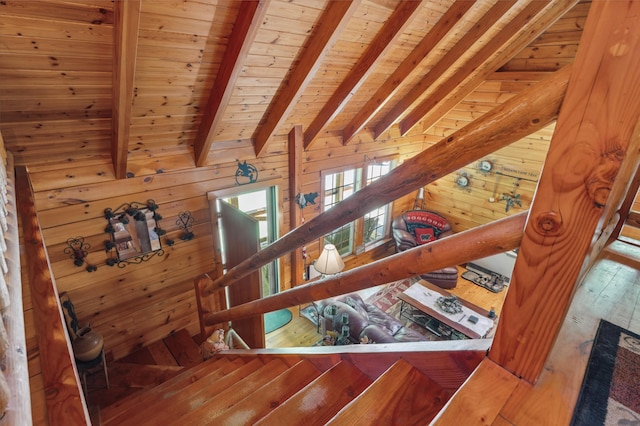 2451 Riverside Dr, Vassalboro, ME 04989 - stairs featuring wood ceiling with exposed beams, wood walls, and wood-type flooring