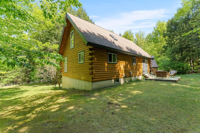 2451 Riverside Dr, Vassalboro, ME 04989 - view of home's exterior with a lawn and log exterior
