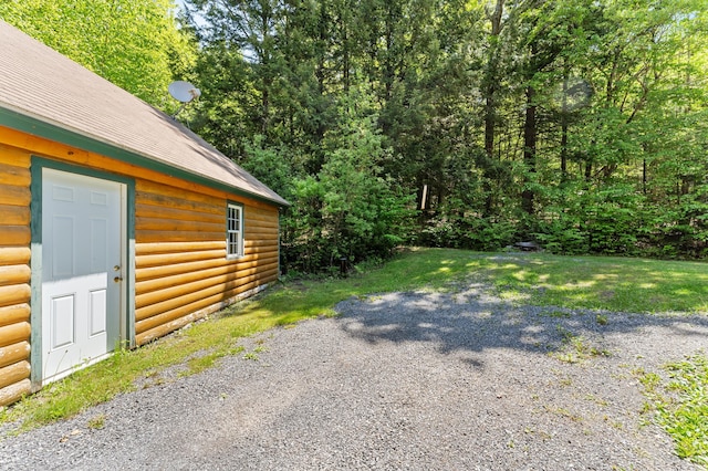 2451 Riverside Dr, Vassalboro, ME 04989 - view of side of property featuring log veneer siding