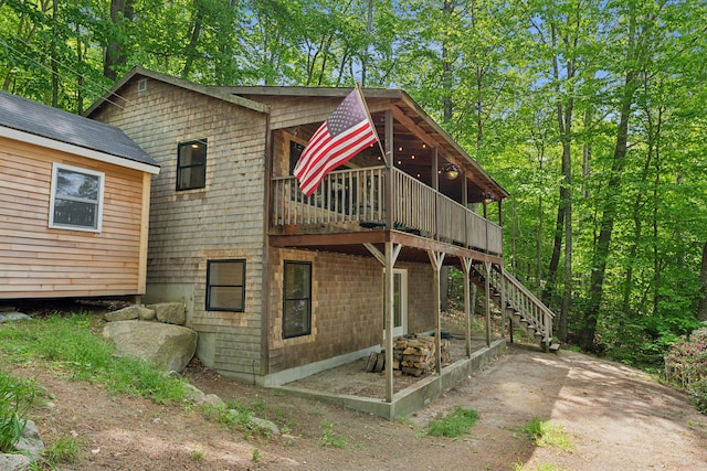 82 Harbor Rd, Naples, ME 04055 - rear view of property with a deck and stairway