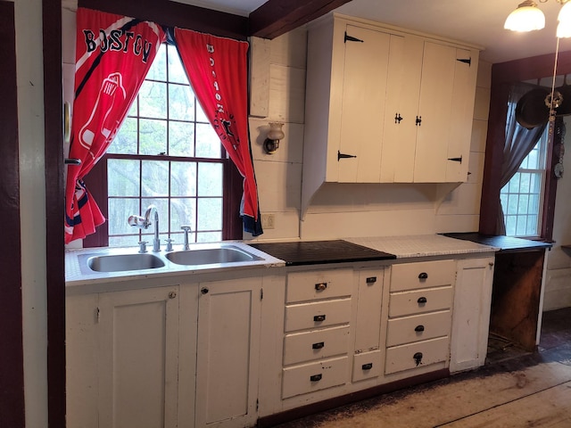 627 Waterville Rd, Skowhegan, ME 04976 - kitchen with a sink, white cabinets, healthy amount of natural light, and light countertops