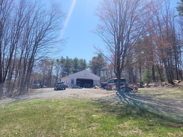 627 Waterville Rd, Skowhegan, ME 04976 - view of yard featuring a detached garage and an outdoor structure