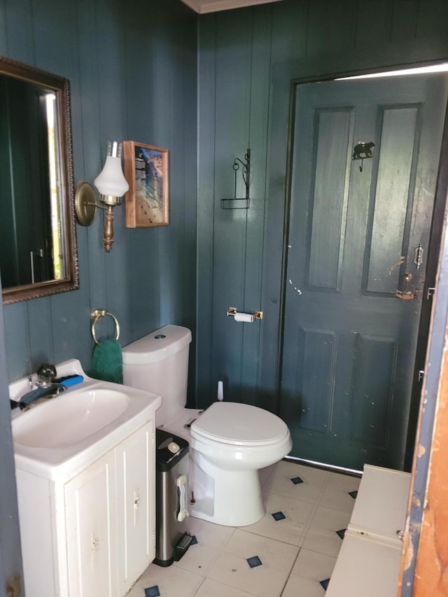 627 Waterville Rd, Skowhegan, ME 04976 - bathroom featuring vanity, toilet, and tile patterned flooring