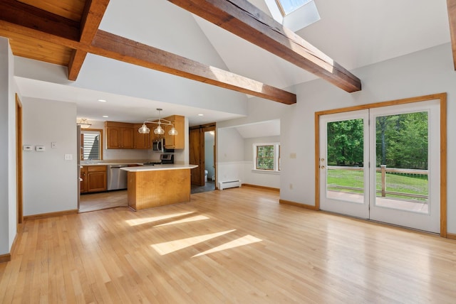 198 Range Rd, Cumberland, ME 04021 - kitchen featuring light countertops, beamed ceiling, light wood-type flooring, appliances with stainless steel finishes, and a skylight