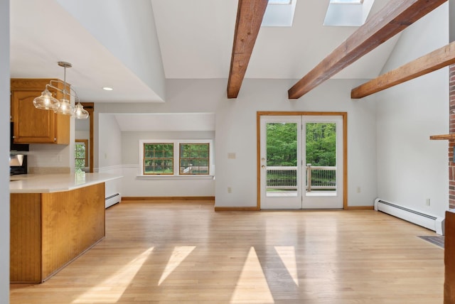 198 Range Rd, Cumberland, ME 04021 - unfurnished living room featuring baseboard heating, a skylight, light wood-style flooring, baseboards, and recessed lighting