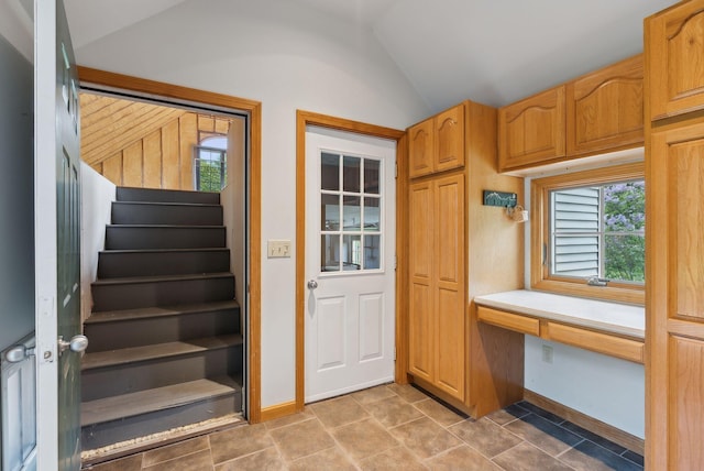 198 Range Rd, Cumberland, ME 04021 - entryway featuring vaulted ceiling, baseboards, and stairway