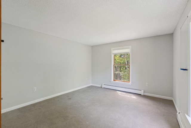 198 Range Rd, Cumberland, ME 04021 - carpeted empty room with a baseboard heating unit, baseboards, and a textured ceiling