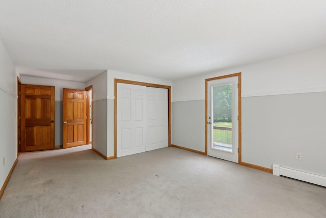 198 Range Rd, Cumberland, ME 04021 - unfurnished bedroom with access to outside, a baseboard radiator, a closet, light carpet, and baseboards
