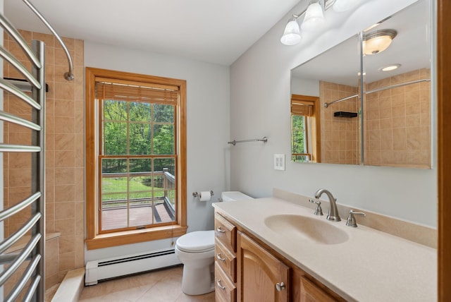 198 Range Rd, Cumberland, ME 04021 - full bath featuring a baseboard heating unit, toilet, vanity, tile patterned floors, and tiled shower